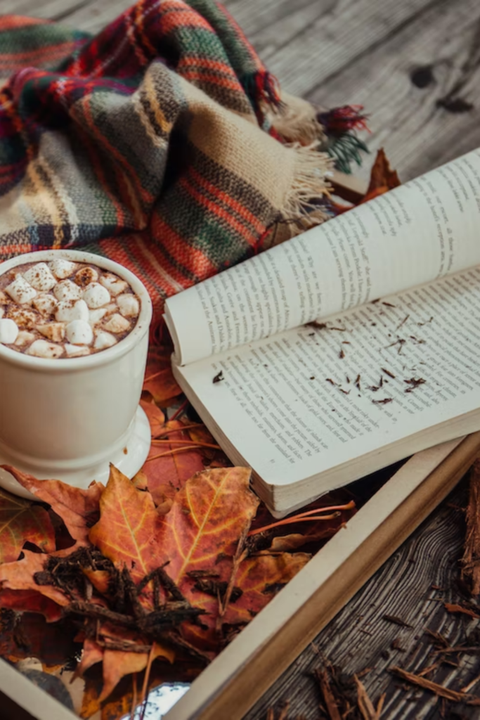 fall activities reading with hot chocolate